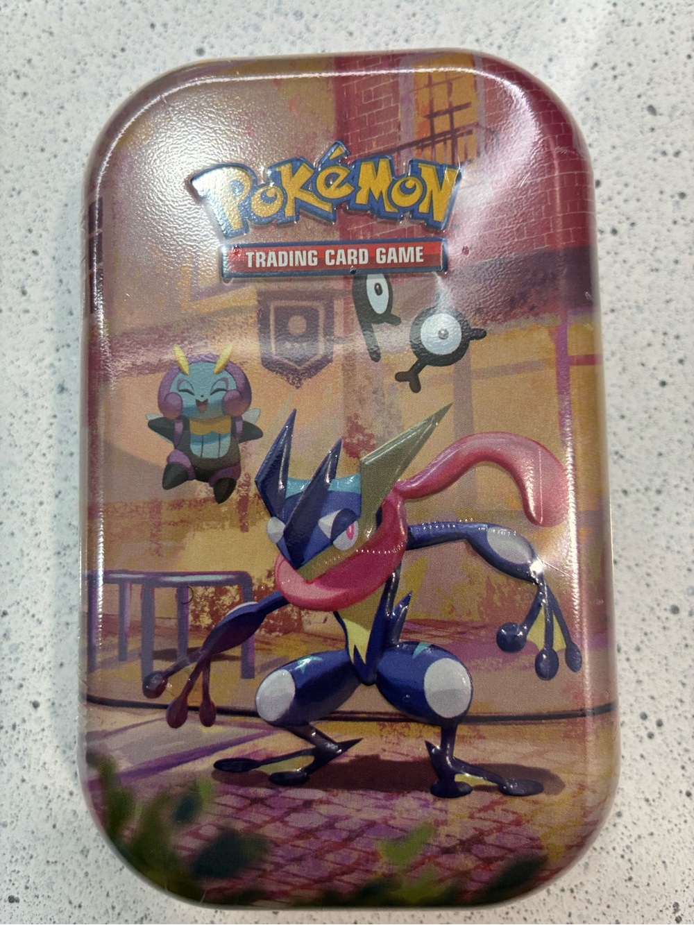 Pokémon Trading Card Game Tin — Pink and Purple Greninja Design